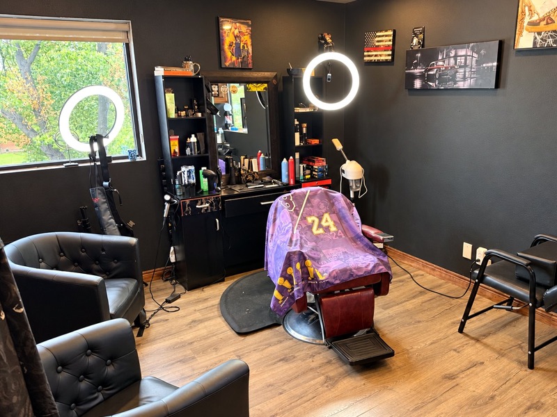 Private barber suite at Springs Spa & Salon in Colorado Springs, with a barber chair, ring lights and a big window